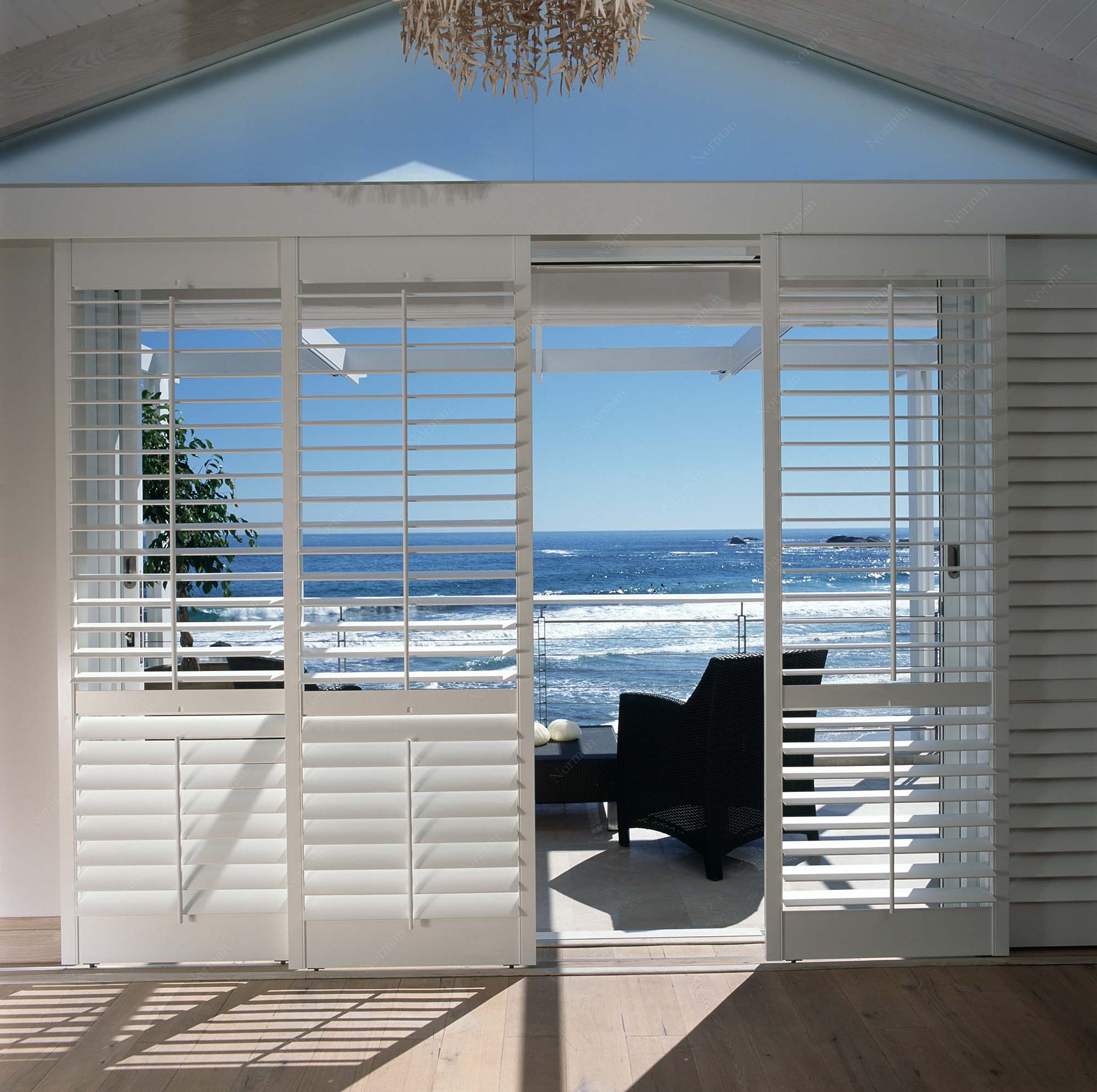 bedroom in byron bay house with plantation shutters